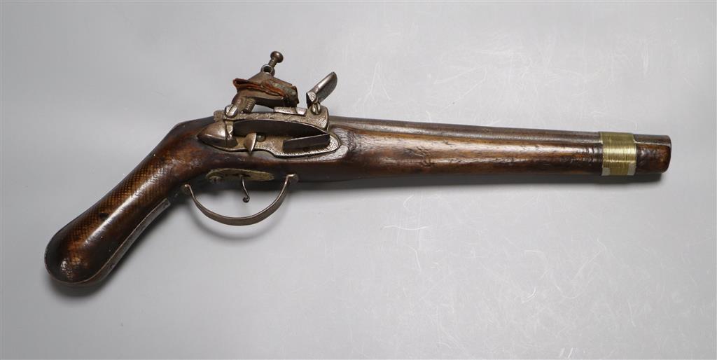 A late 18th century flintlock holster pistol, with walnut stock, 37cm long